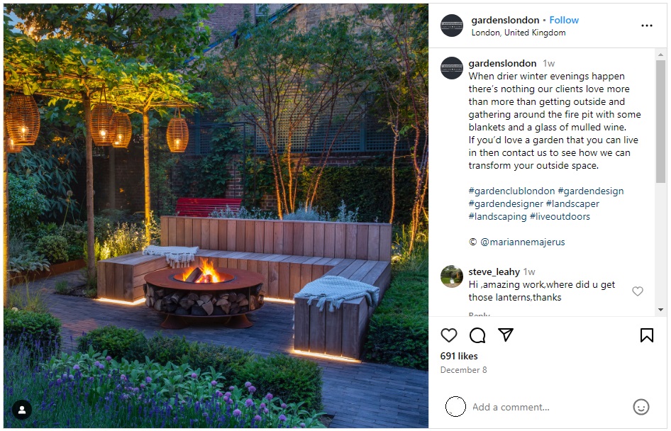 A garden business Instagram account's post showcasing a fire pit in the garden